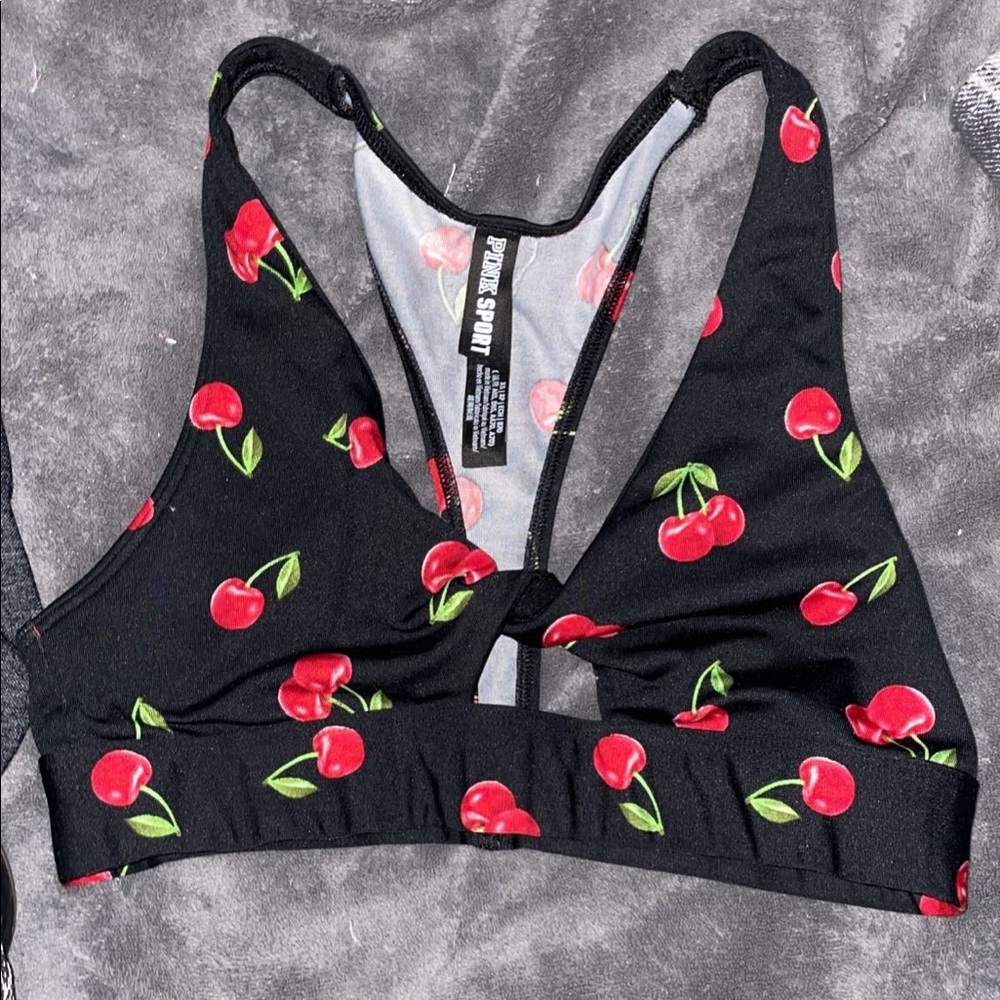 pink sports bra/ swim top with cherrys